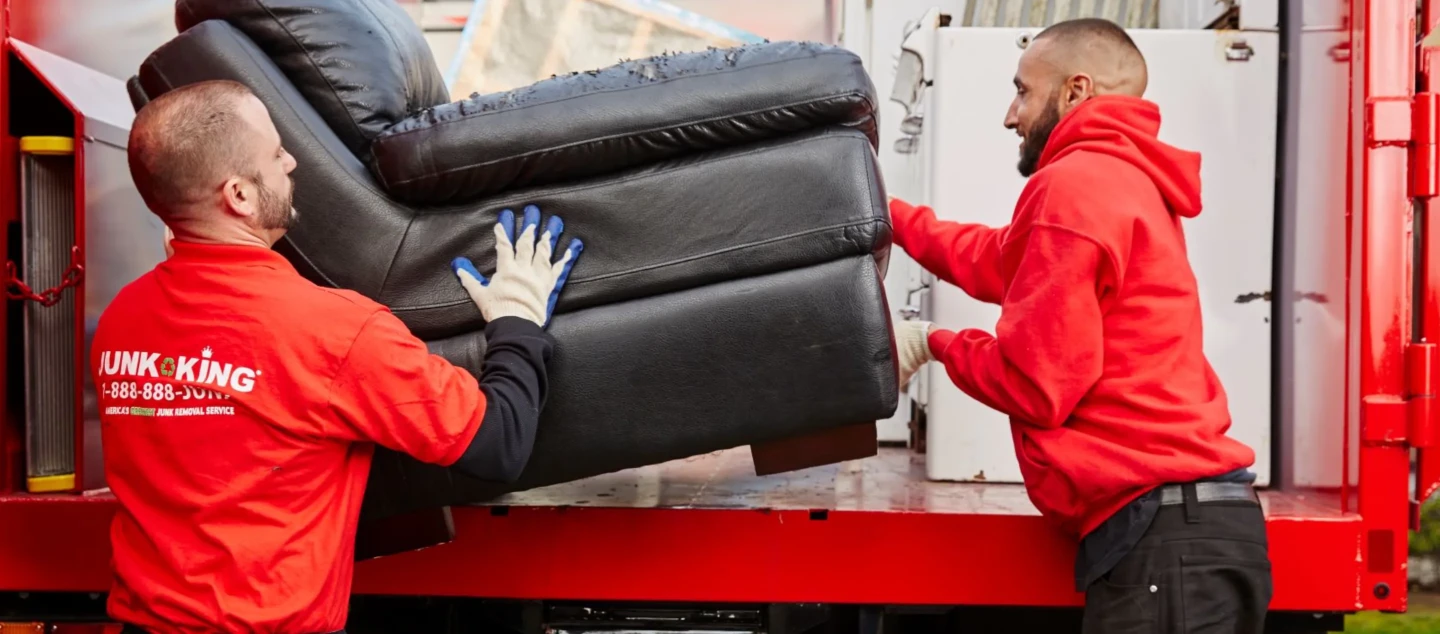 Loading furniture into truck.