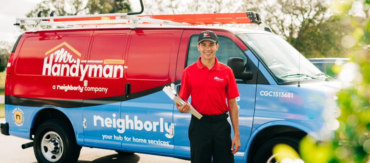 Mr. Handyman professional and van.
