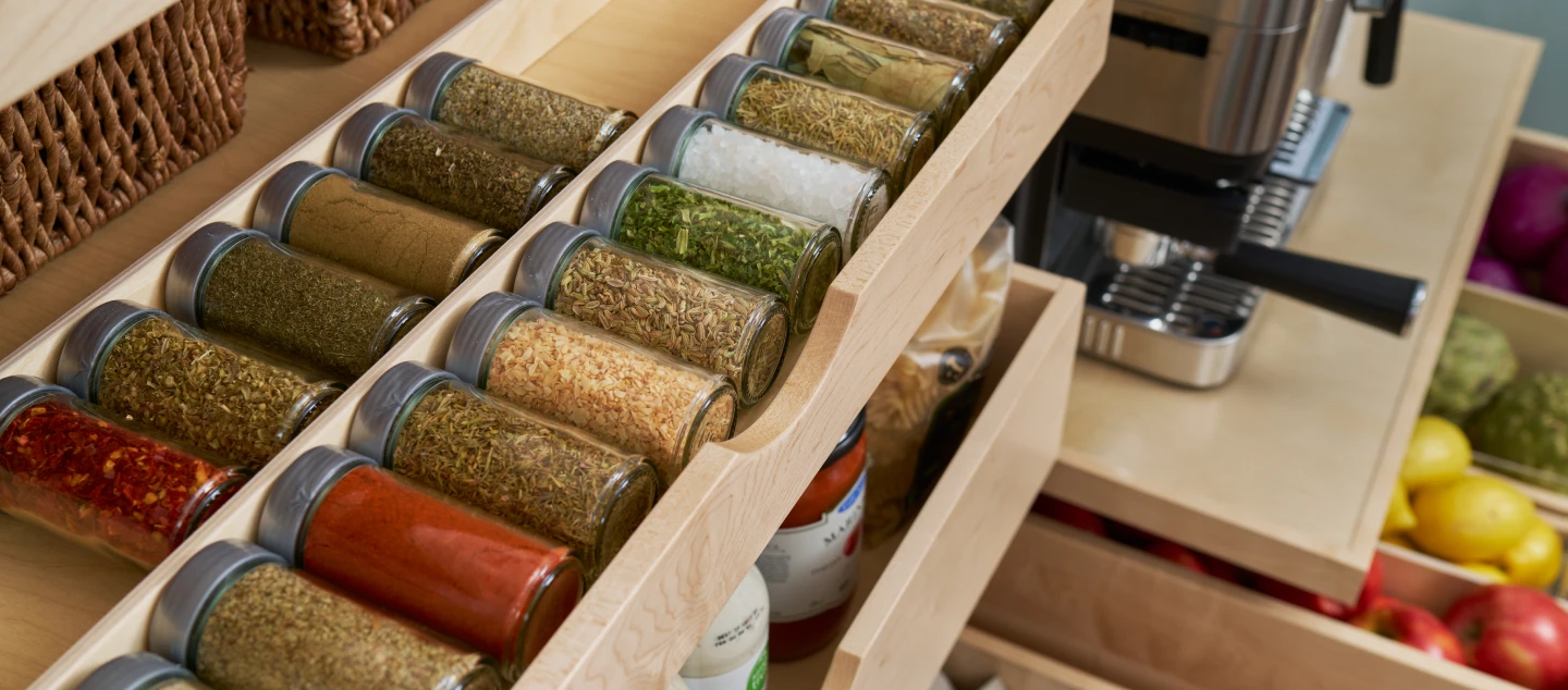 Spices organized in drawer.
