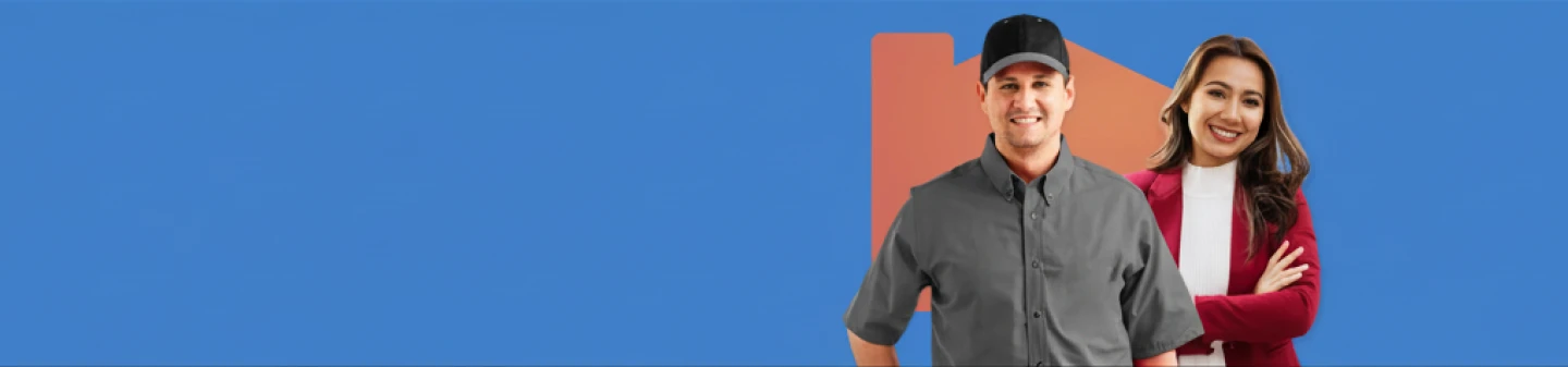 Smiling man and woman on blue background.