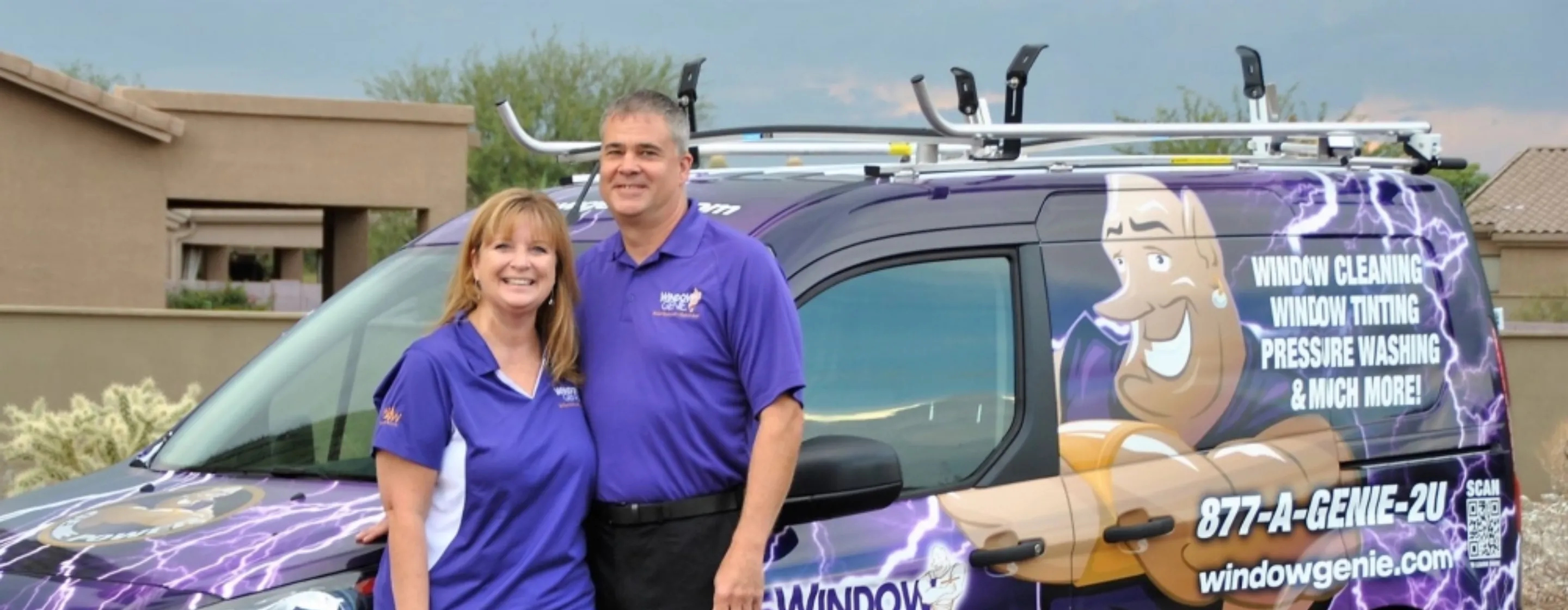 Bret and Melissa with branded Window Genie truck.